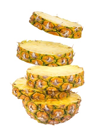 Slices of pineapple isolated on white background with clipping pathの写真素材