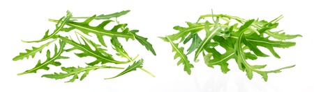 Heap of fresh rucola leaves isolated on white background with clipping pathの写真素材