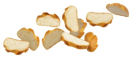 Falling slices of white bread isolated on white background