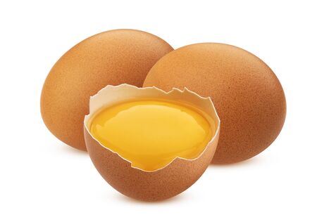 Whole and broken chicken eggs isolatedの写真素材