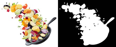 Different vegetables falling into frying pan on white backgroundの写真素材
