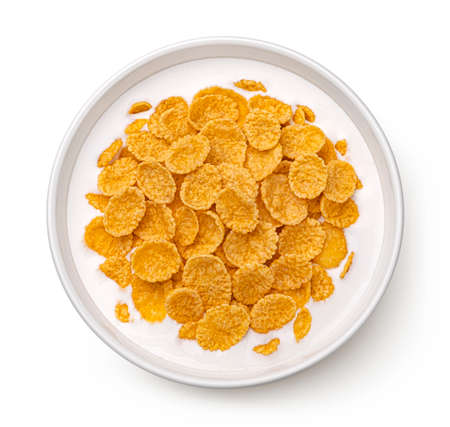 Corn flakes with milk isolated on white background, top view