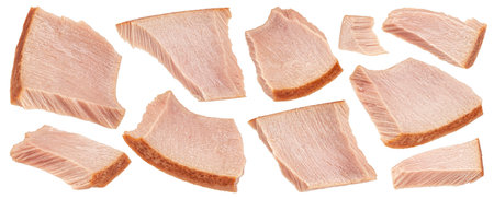 Canned tuna fish pieces isolated on white background