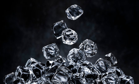 Falling ice cubes on black background