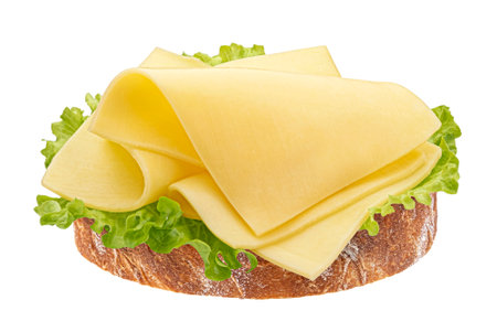 Gouda slices on bread, cheese sandwich isolated on white backgroundの写真素材