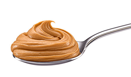 Caramel cream, boiled condensed milk swirl in spoon isolated on white background, AI generatedの素材