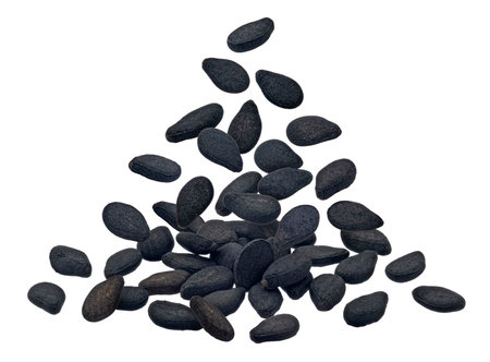Falling black sesame seeds isolated on white background with clipping pathの写真素材