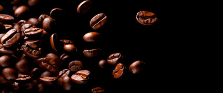 Falling roasted coffee beans over black background with copy space, AI generatedの素材