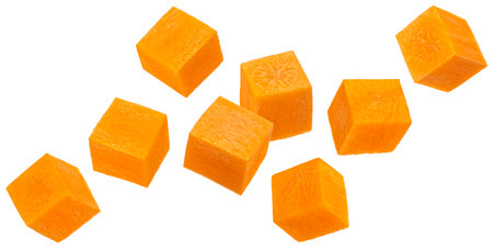 Carrot cubes isolated on white backgroundの写真素材