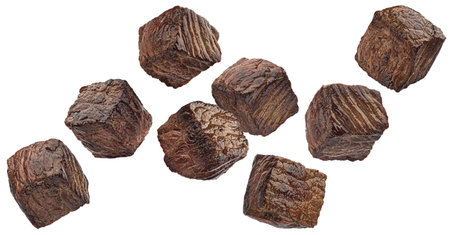 Grilled beef cubes isolated on white backgroundの写真素材
