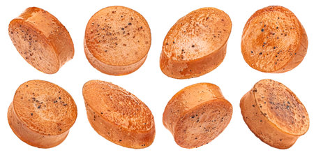 Fried sausage slices isolated on white background, full depth of fieldの写真素材