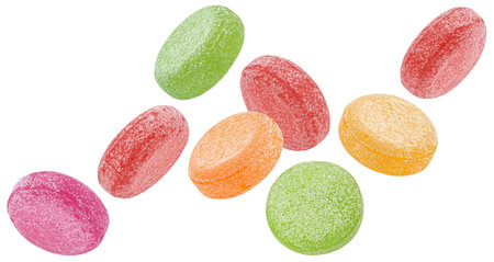 Fruit caramel, hard candy collection, round sweet lollipops isolated on white backgroundの写真素材