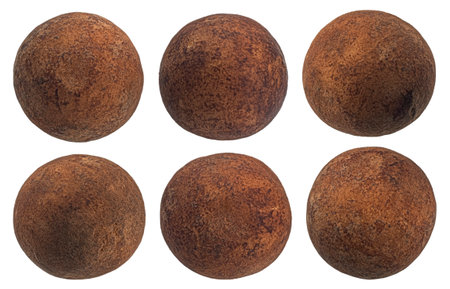 Chocolate truffles balls, round candies coated with cocoa powder with marzipan filling isolated on white backgroundの写真素材