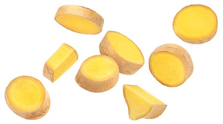 Ginger root slices isolated on white background with clipping pathの写真素材
