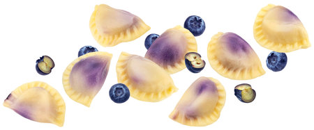 Traditional vareniki with berry filling, blueberry filled dumplings isolated on white background with clipping pathの写真素材