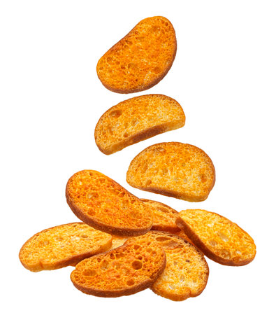 Spicy bruschetta crackers, round bread croutons isolated on white backgroundの写真素材