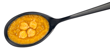 Vegetarian chickpea cream soup in spoon isolated on white background, top viewの写真素材