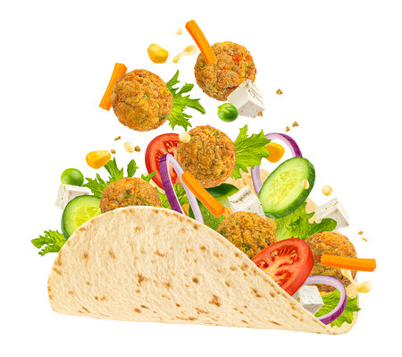 Vegetarian tortilla wrap, shawarma sandwich with falafel isolated on white background, full depth of fieldの写真素材