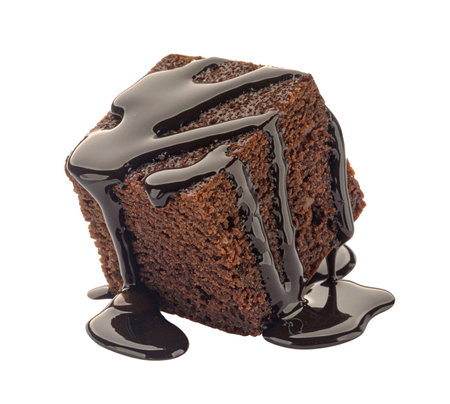 Brownie piece with melted chocolate cream isolated on white background with clipping pathの写真素材