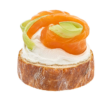 Smoked salmon, cucumber and cream cheese on bread slice isolated on white backgroundの写真素材