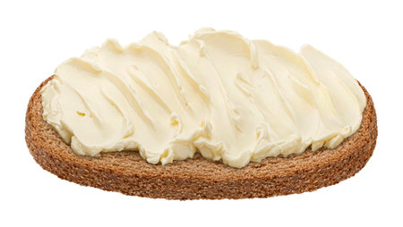 Rye bread slice with butter spread isolated on white background with clipping pathの写真素材