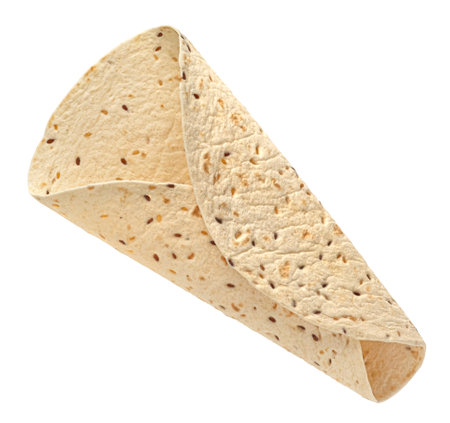Empty folded lavash with flax seeds isolated on white background with clipping path, full depth of fieldの写真素材