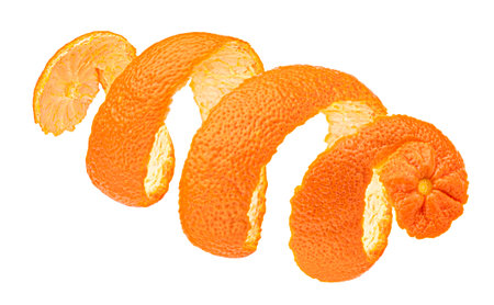 Twisted orange peel isolated on white background with clipping path, package design element, full depth of fieldの写真素材