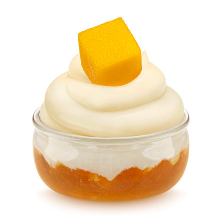Healthy layered dessert, glass jar of yogurt with mango jam isolated on white backgroundの写真素材