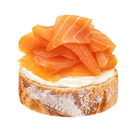 Smoked salmon slices with cream cheese isolated on white background with clipping pathの写真素材