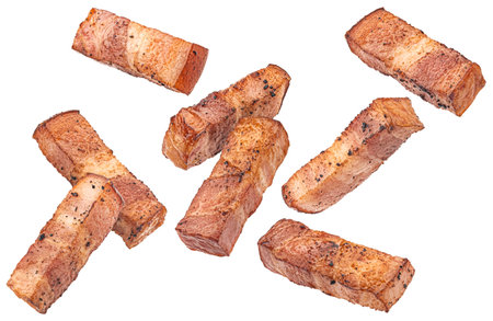 Fried Italian pancetta isolated on white background with clipping path, full depth of fieldの写真素材