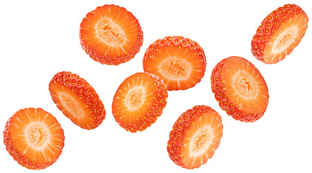 Round strawberry slices isolated on white background with clipping path, flying fruit pieces, copy spaceの写真素材