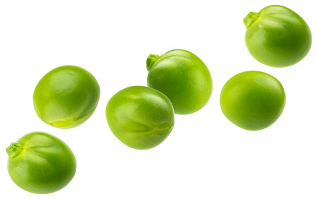 Fresh green peas isolated on white background with clipping path, copy space, full depth of fieldの写真素材