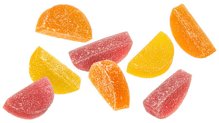Orange and lemon marmalade candies, citrus jelly slices isolated on white background