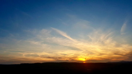 Beautiful sunset over the mountains. Beautiful sky. Nature background.の写真素材
