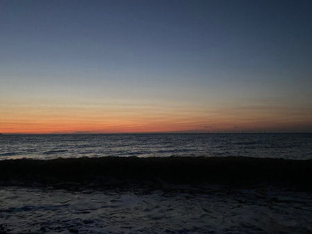 Sunset on the beach in the tropics. The sea and the sky.の写真素材