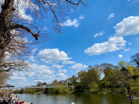the Regent's Park, Blue skies reflect in the still water.の写真素材