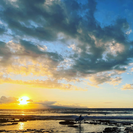 Sunset over the Pacific Ocean in Kailua Kona, Hawaii.の写真素材
