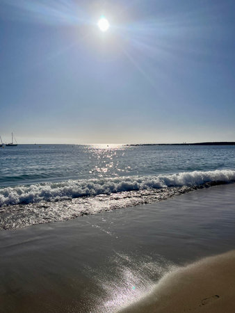 Sunset on the beach in Cadiz, Andalusia, Spainの写真素材