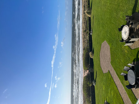 Aerial view of the beach and the sea on a sunny dayの写真素材