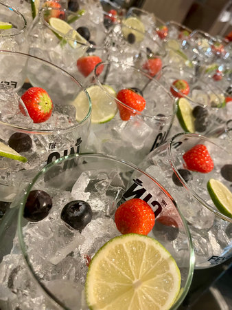 Strawberry mojito with lime, black olives and iceの写真素材