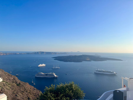 Santorini, Greece. Panoramic view of the caldera with cruise shipsの写真素材