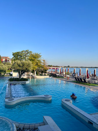 Luxury swimming pool in the hotel resort. Summer vacation.の写真素材