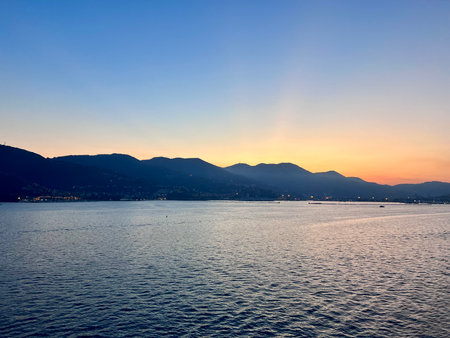 Sunset on Lake Como, Italy. View from the sea.の写真素材