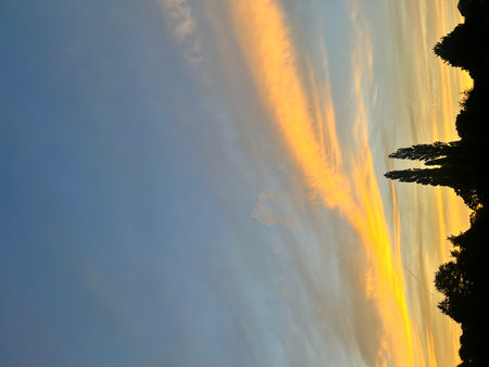 sunset in the sky, clouds and sun rays, nature seriesの写真素材