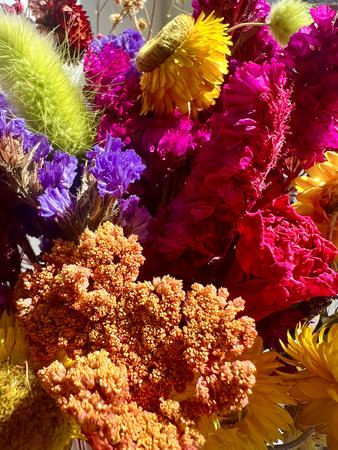 Colorful bouquet of dried flowers for sale in the market.の写真素材