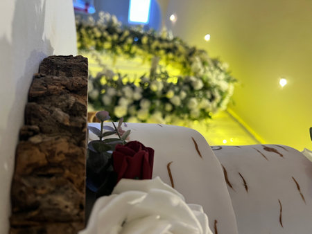 Wedding decoration with candles and flowers in the interior of the roomの写真素材