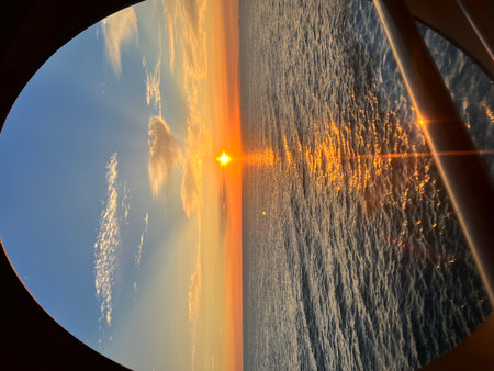 Sunset over the sea from the window of a ship, Greeceの写真素材