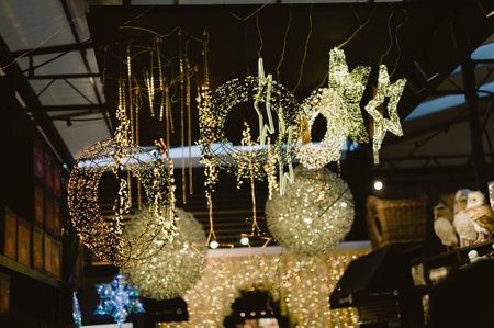 A Christmas tree with lights and a star on top.の写真素材