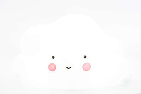 childrens light in the shape of a cloud isolated on a white backgroundの写真素材