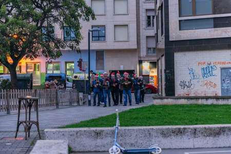 29th June 2021, Cangas de Morrazo, Pontevedra, Spain. A group of traditional Galician bagpipe musicians playing in the streets of Cangas de Morrazo.のeditorial素材